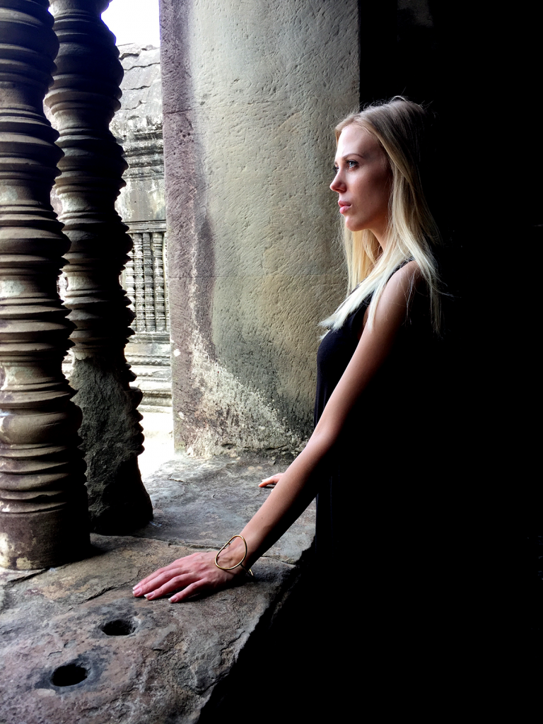 model posing at Angkor wat