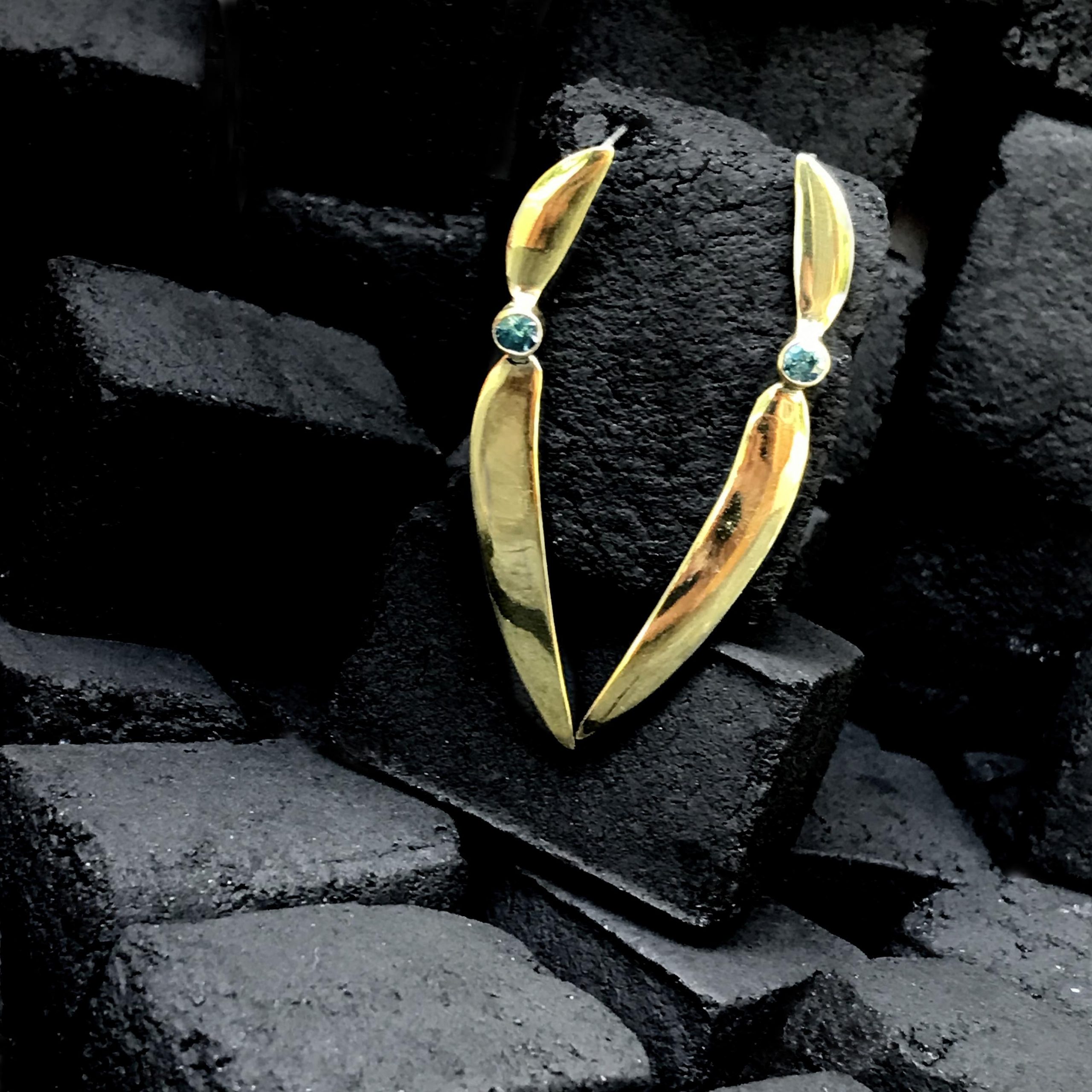 Earrings with zircon stones