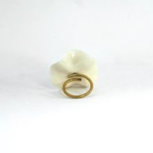 Back of flower shaped ring.