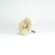 White flower shaped ring.